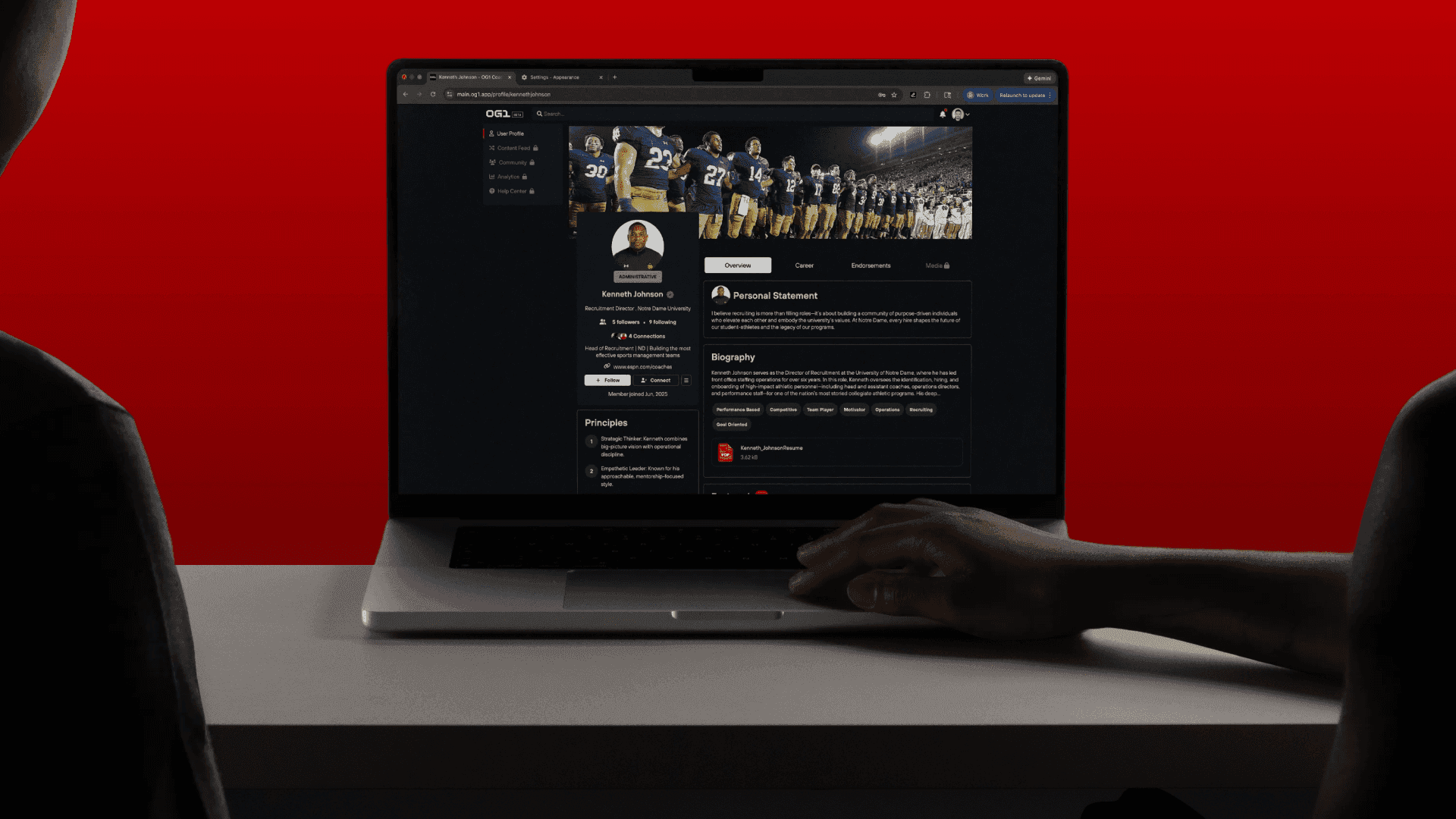 An OG1 coach profile on a laptop screen